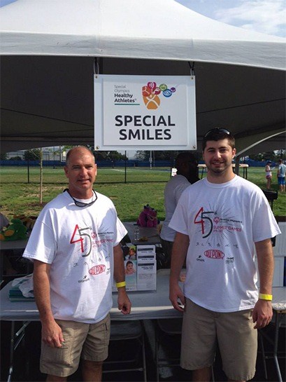 Selbyville dentist and team member at community health event