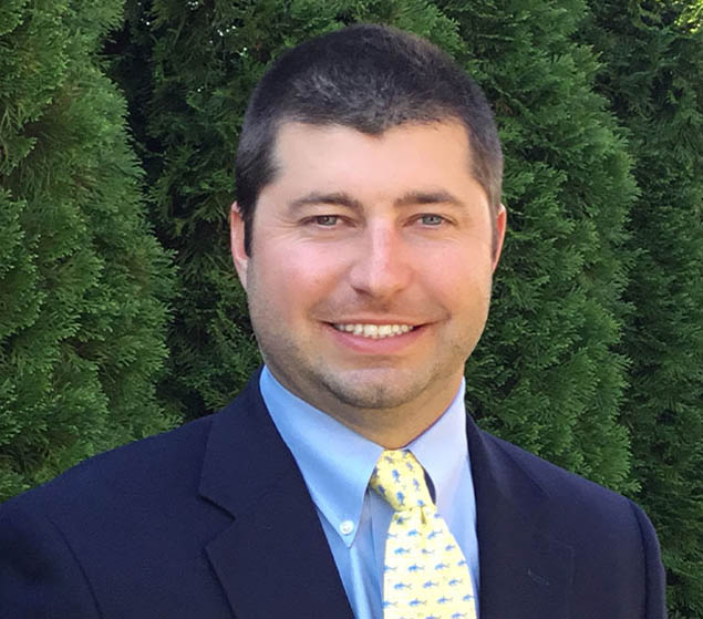 Selbyville dentist Doctor Paul J Kramer smiling in a suit