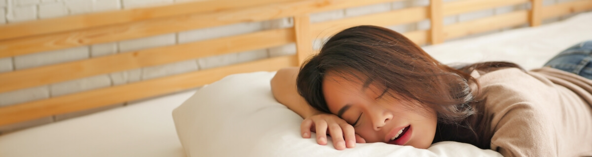 Woman sleeping with her mouth open