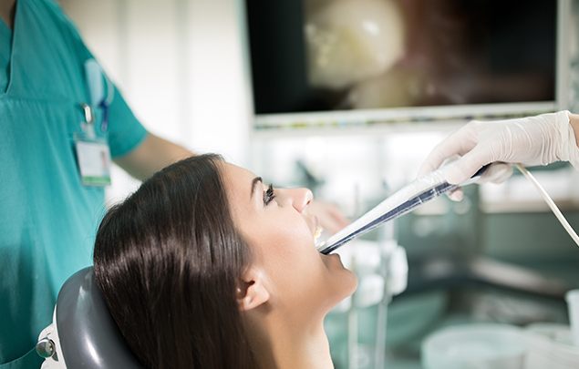 Dentist capturing intraoral images