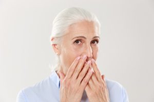 older woman gum disease and facial shape issues