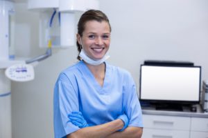 Dental hygienist helping with patient care