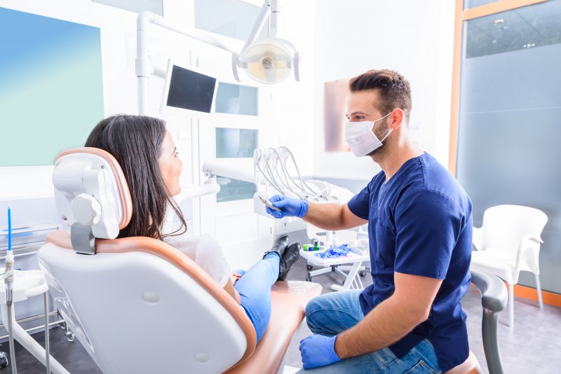 A dentist explaining the importance of routine dental checkups in Selbyville